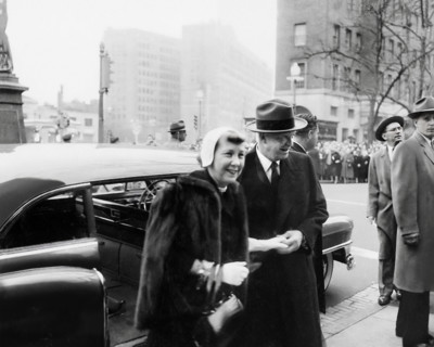 U.S. President-elect Dwight D. Eisenhower and his wife Mamie Eisenhower exiting car to attend
