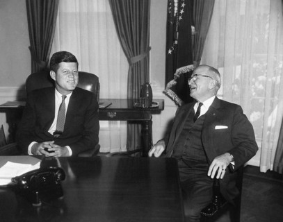 U.S. President John F. Kennedy (left) talking with former U.S. President Harry S. Truman (right) in