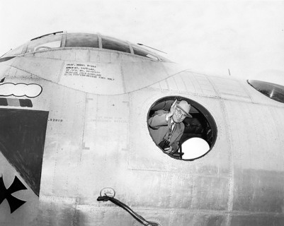 U.S. President Harry S. Truman waving from inside B-36A bomber at an air show, Andrews Air Force