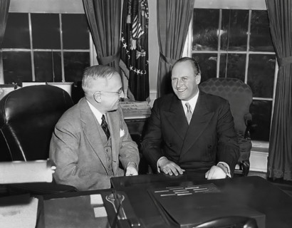 U.S. President Harry S. Truman (left) at his desk with Crown Prince Olav of Norway (right) in the