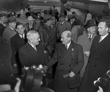 U.S. President Harry S. Truman (foreground, left) greeting British Prime Minister Clement Attlee