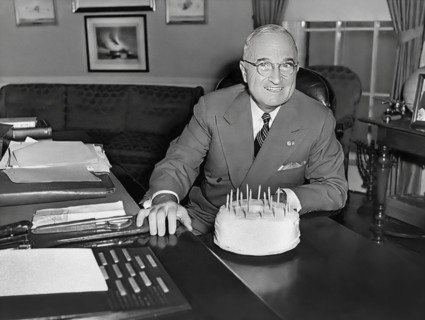 U.S. President Harry S. Truman receiving a cake for his 67th birthday, White House Oval Office,