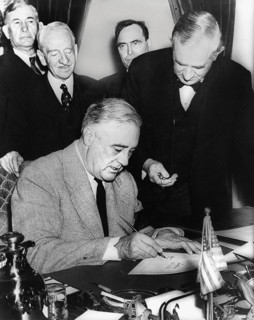 U.S. President Franklin D. Roosevelt signing declaration of war against Germany, marking U.S. entry