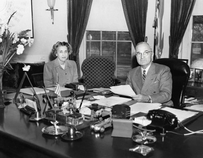 U.S. President Harry S. Truman and Rose Conway, his secretary, at the President's desk in the White