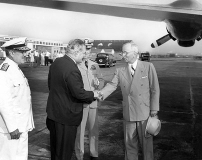U.S. President Harry S. Truman shaking hands with Brazilian Ambassador Carlos Martins as they
