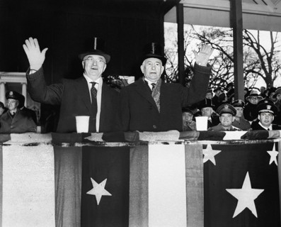 U.S. President Harry S. Truman (left) and U.S. Vice-President Alben Barkley (right) waving from
