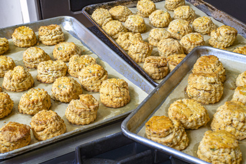 Baking sheets filled with savory scones