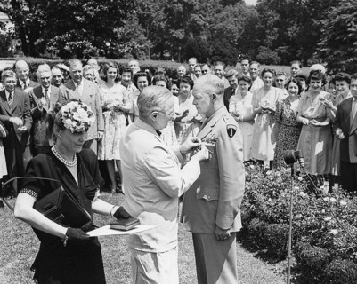 U.S. President Harry S. Truman (center) pinning Distinguished Service Medal on U.S. General Dwight