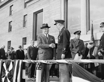 U.S. President Harry S. Truman (right center) shaking hands with retiring U.S. Army Chief of Staff