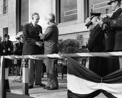 U.S. President Harry S. Truman (right center) shaking hands with retiring U.S. Army Chief of Staff