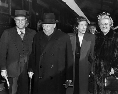 Former British Prime Minister Winston Churchill (second from left) with his wife Clementine