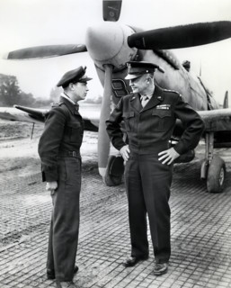 U.S. General Dwight D. Eisenhower talking to flight officer A. K. Asbos, Brisbane, Australia, in