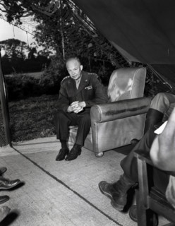 U.S. General Dwight D. Eisenhower holding press conference for war correspondents at his advance