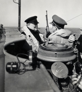 Prime Minister Winston Churchill of Great Britain, left, chatting with British General Sir Alan