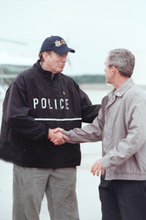 New York Governor George Pataki greeting U.S. President George W. Bush upon his arrival at McGuire