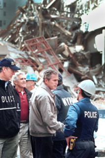 U.S. President George W. Bush touring World Trade Center disaster site with New York Governor
