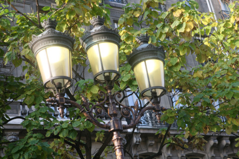 France, detail of a three-light streetlamp