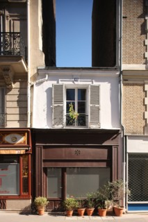 France, Small building between two buildings