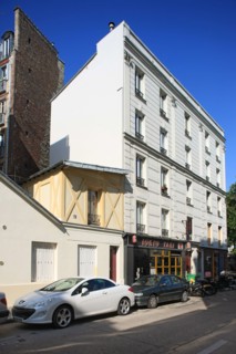 France, Small building surrounded by two others