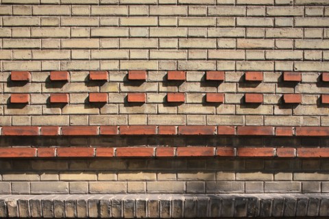 France, Detail of the school facade de la tombe issoire