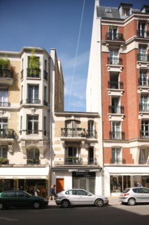 France, Small building surrounded by two others higher