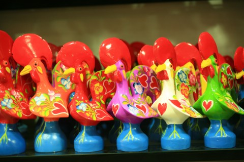 Detail of a rooster, windowshop in Lisbon