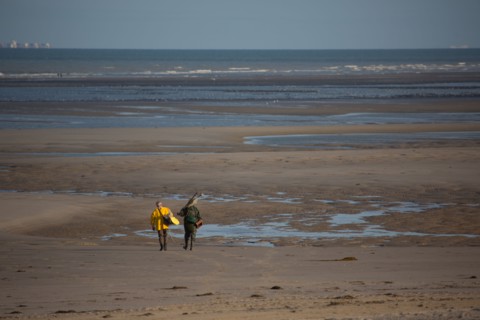 Le Touquet Paris Plage, fishermen in yellow oilskins
