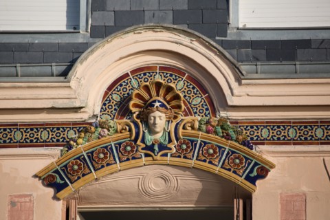 Mers les Bains, pediment of a facade on the seafront