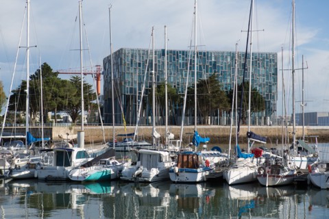 Lorient, port, docked boats and Lorient Agglomeration building