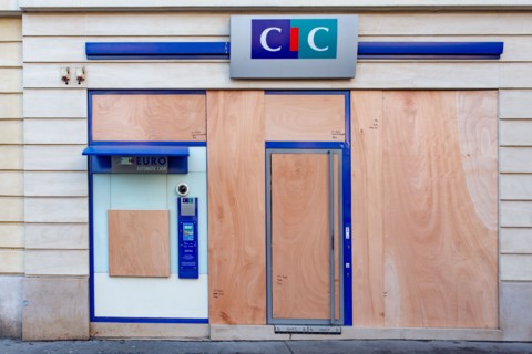 Paris, windows of a bank protected with sealed wood panels
