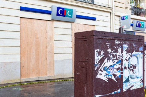 Paris, windows of a bank protected with sealed wood panels