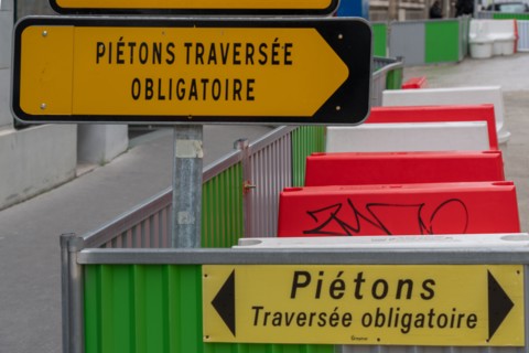 Paris, mandatory crossing sign