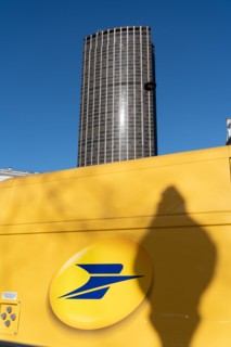 Paris, logo of the French post and Tour Montparnasse in the distance
