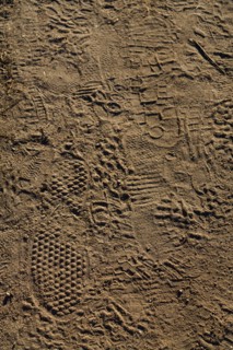 Hikers' footprints on the coastal path, Le Conquet, North tip of Finistère