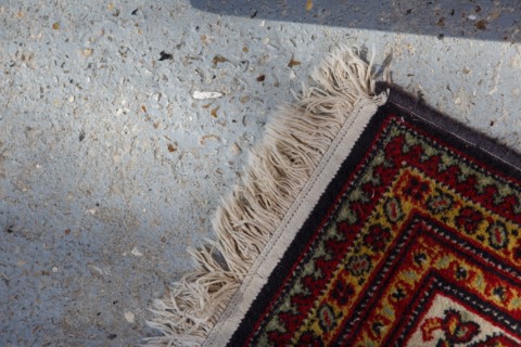 Carpet on concrete floor