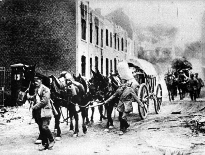 Food raid by German soldiers in an abandoned French village.