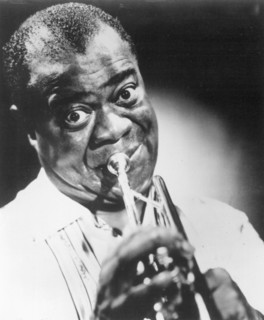 The United States.  Louis " Satchmo " Armstrong.  Trumpet player.