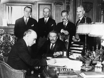 About 1928. France and Yugoslavia.sign a Treaty of Friendship.