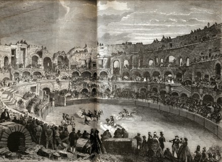 A bull fight in the Nîmes bullring.