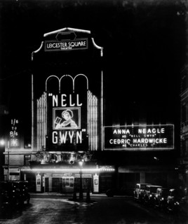 Night view of the Leicester Square theatre, London, c1930