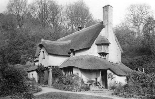 A thatched cottage at Selworthy Green, Selworthy, Somerset, c1900