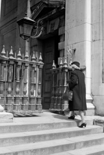 Woman entering the church of St Martin in the Fields, London, c1950