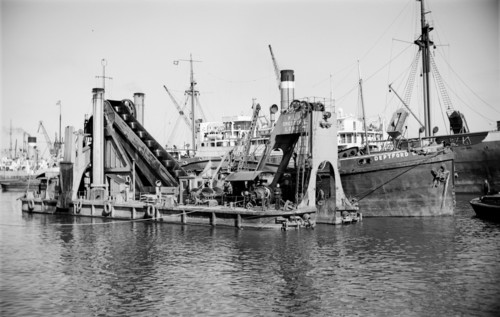 A dredger moored in Tilbury Docks, Essex, c1945-c1965