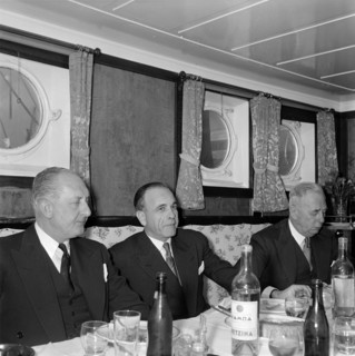 Group of men dining on board a ship, 1945