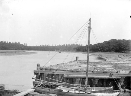 Small boats moored alongside a town jetty, Beaulieu, Hampshire, c1860-c1922