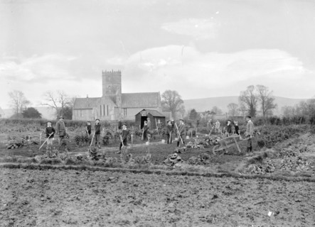Schoolboys working in the school garden supervised by a teacher, Uffington, Oxfordshire, 1916