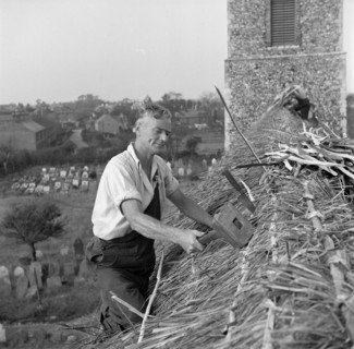 Thatching the roof of St Margaret & All Saints church, Pakefield, Suffolk, 1949