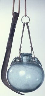 Strigil and flask, Roman. Artist: Unknown