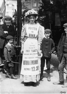 Suffragette advertising a march supporting votes for women, Strand, London, c1909. Artist: Unknown