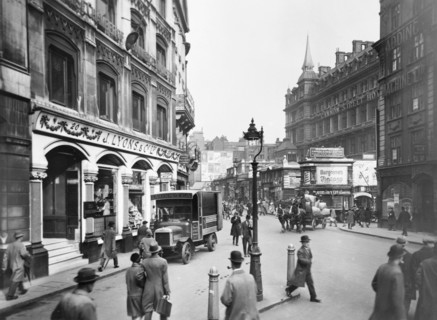 Cannon Street with Lyons shop, hotel and station, London, c1920-c1930.  Artist: George Davison Reid